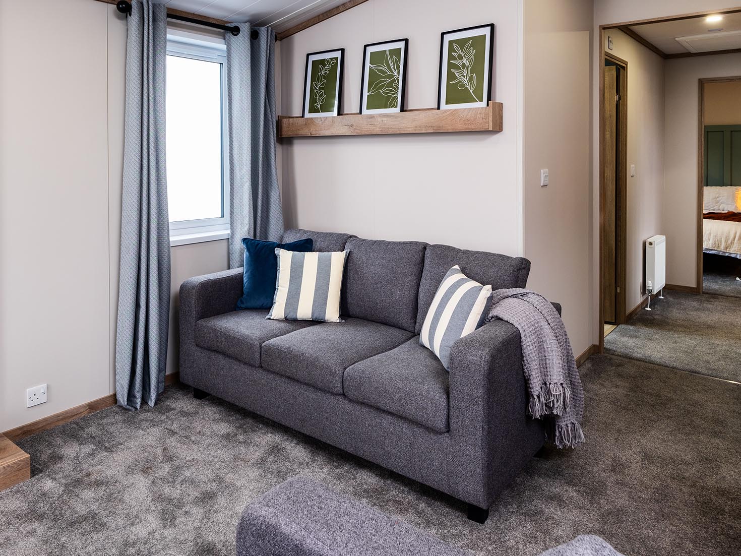 Ash Lodge open-plan living area, Lake District holiday lodge